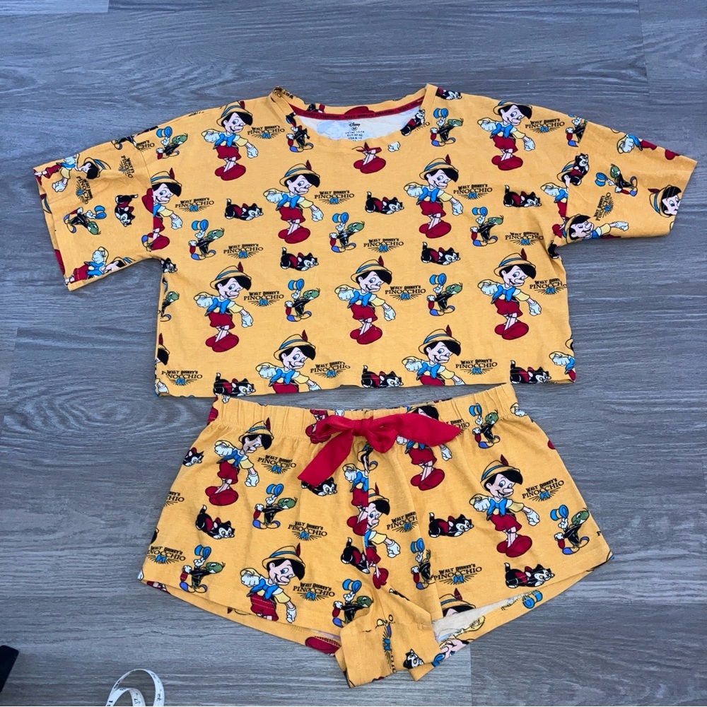 Walt Disney brings us signature Pinocchio PJ’s in Collectors Condition. So Cute